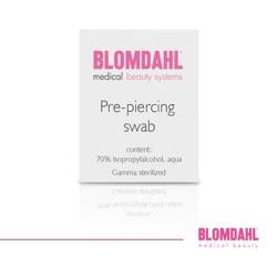 A cotton swab for disinfecting the skin before the piercing procedure